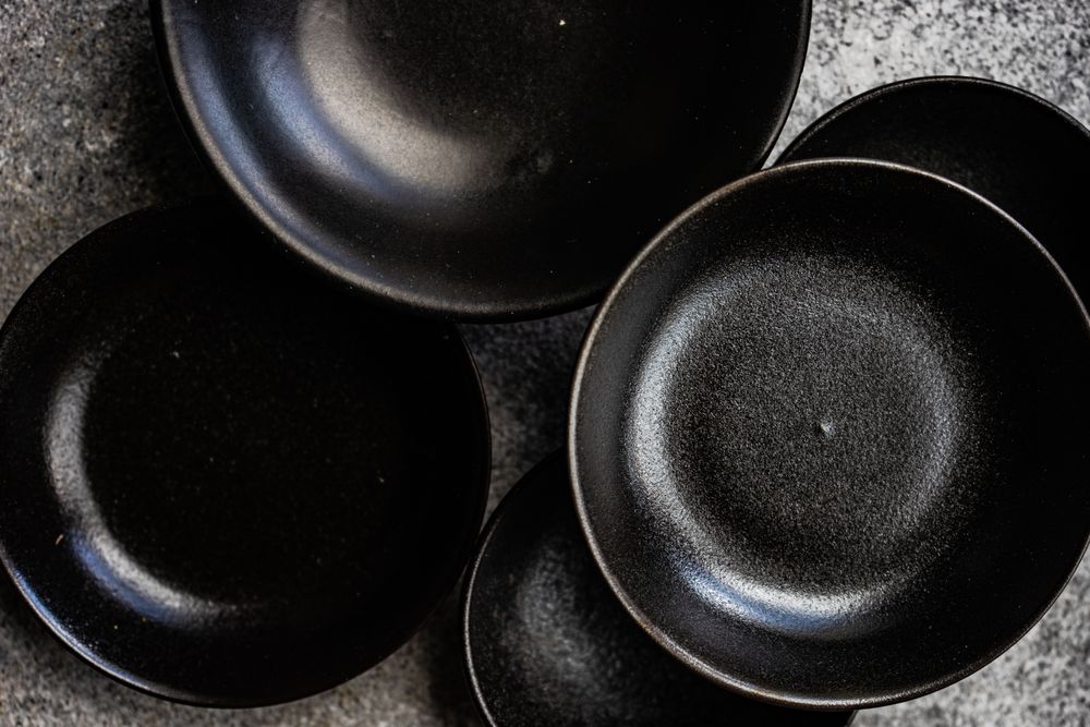 Round geometric stacked dark bowls