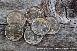 Vintage American Coins on rustic wood 5paJy4