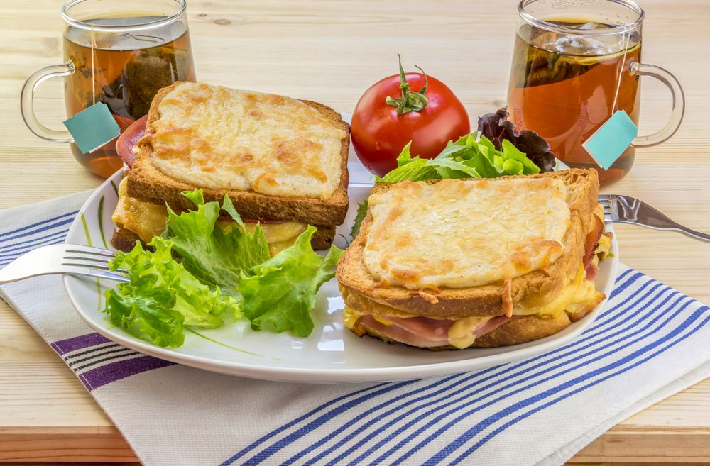 Cheese sandwiches and tee for two people
