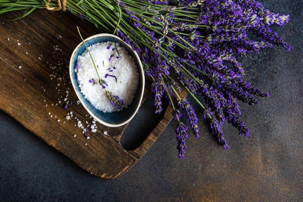 Spa concept with fresh lavender flowers on board
