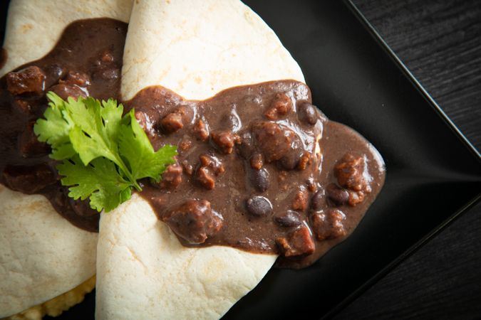 Veracruz eggs wrapped in tortillas decorated with sauce