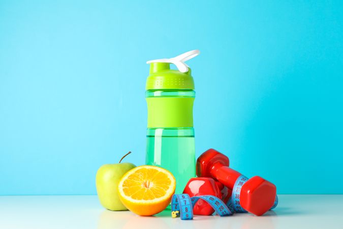 Loss weight accessories on table against blue background
