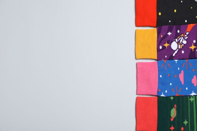 Casual clothes and wearing concept - socks, clothes for foot