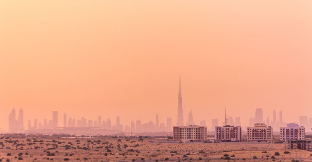 Hazy sky over city in desert