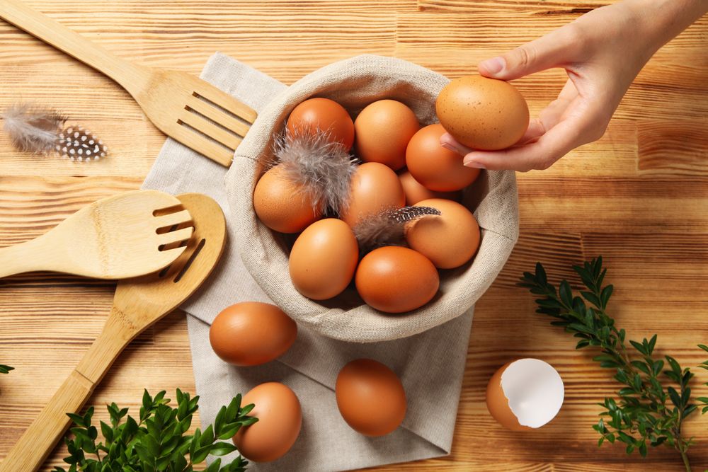 Concept of natural farm product - eggs, top view