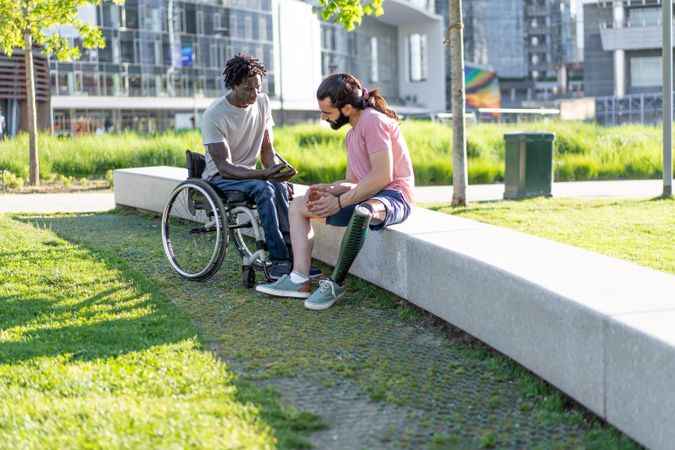 Meaningful park conversation between friends with disabilities