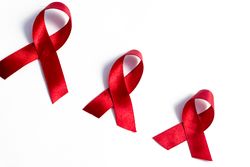 Red ribbons, HIV awareness concept, world AIDS day, world hypertension day, world cancer day with copy space