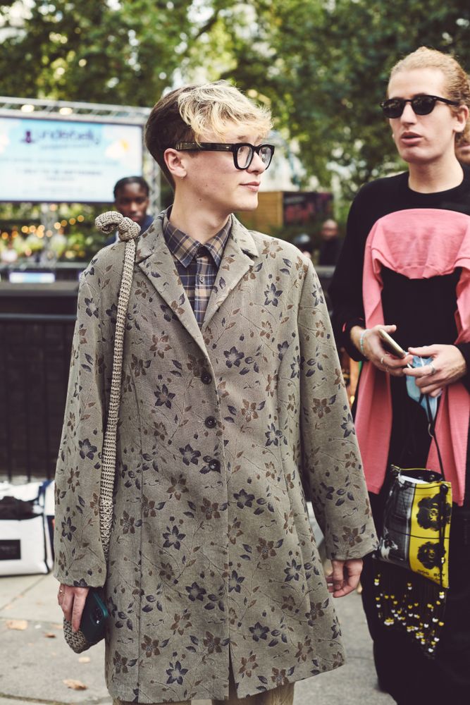 London, England, United Kingdom - September 18 2021: Fashionable man in glasses looking to the side