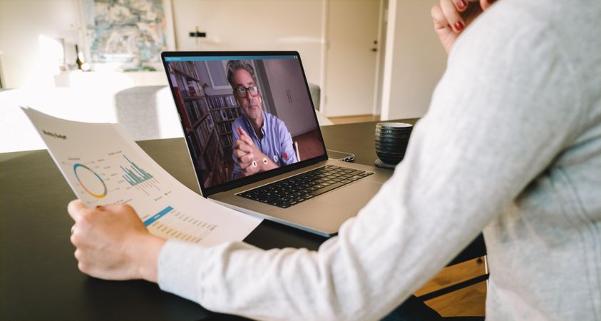 Business partners using laptop for a online meeting on video call