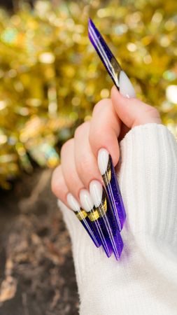 Trendy Purple and Gold Nails
