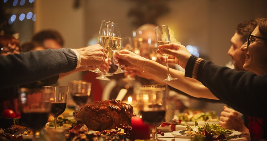 Family, Children and Friends Spend Christmas Dinner Together at Home in the Afternoon.