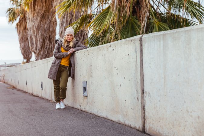 Portrait of blonde woman posing in the city