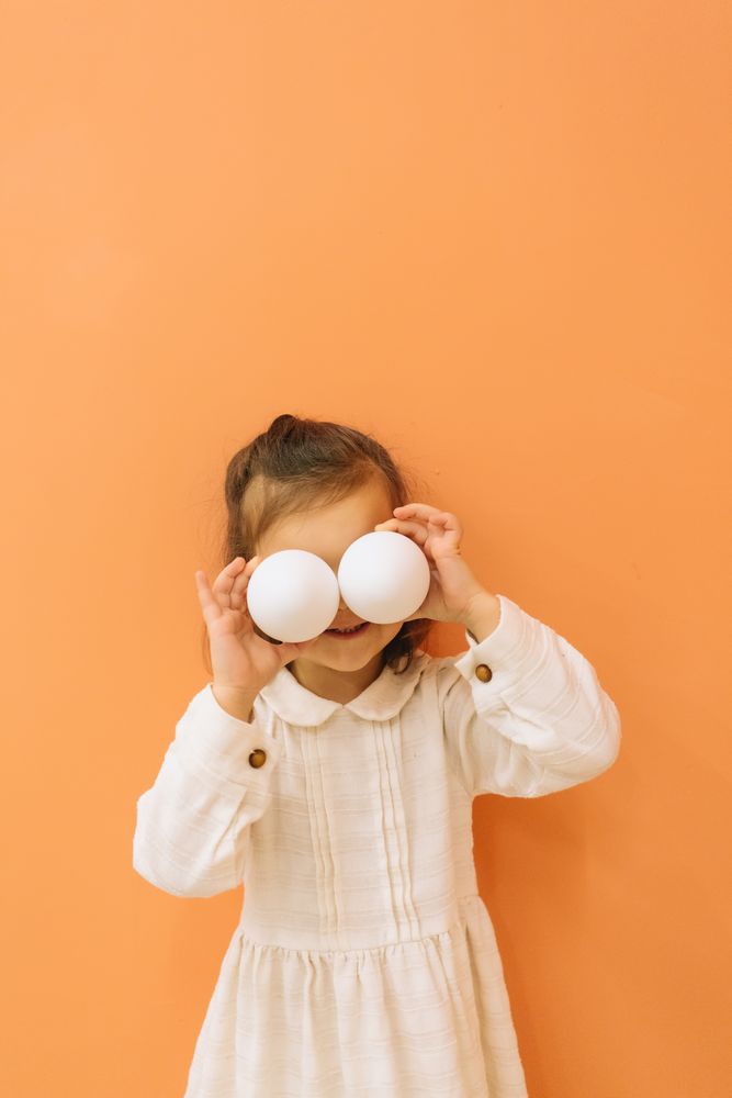 Cute little girl with Easter eggs