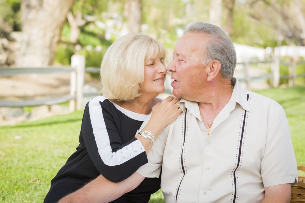 Affectionate Older Couple Portrait At The Park
