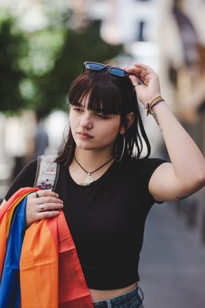 LGBT woman on city street