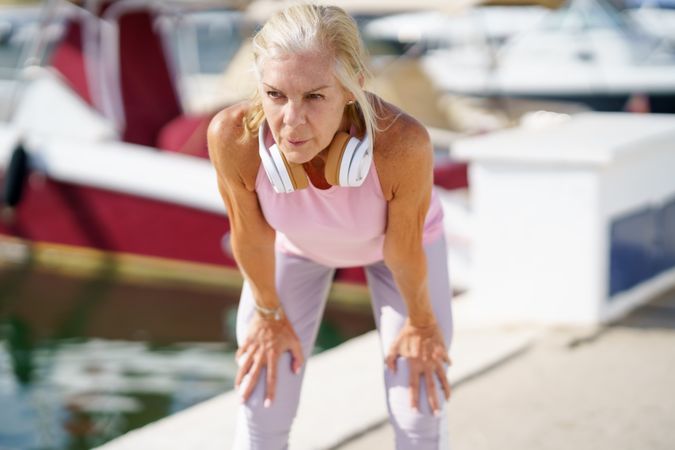 Mature female taking a break during exercise