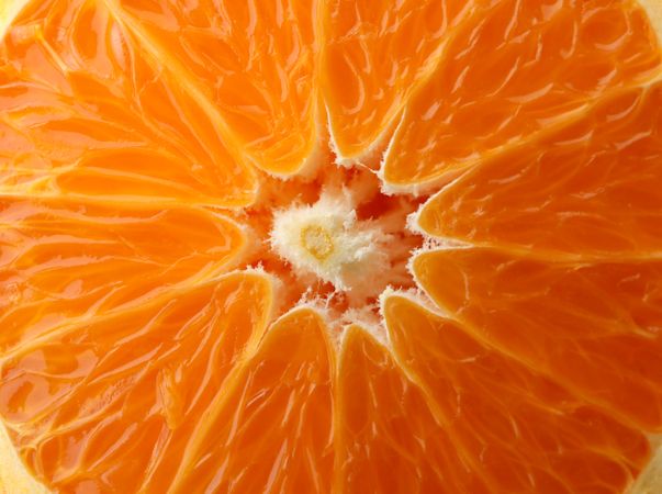 Ripe sweet mandarin on whole background, macro
