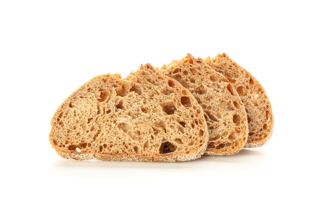 Wheat bread pieces isolated on blank background. Bakery products