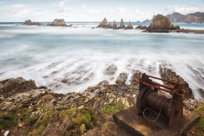 Wonderful ocean rocky coast in fair weather