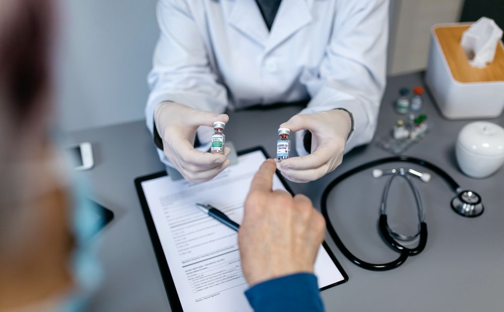 Patient choosing one of the coronavirus vaccines offered by her doctor