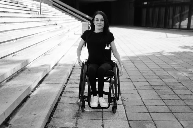 B&W portrait of a woman in wheelchair