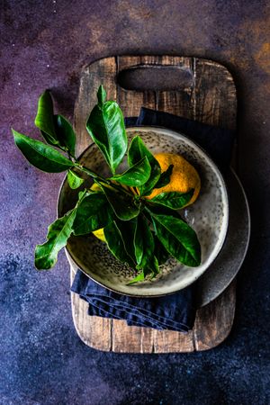 Top view of holiday place setting with tangerines