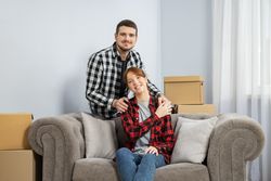 Concept of move with a happy young couple