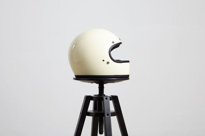 Side shot of motorcycle helmet on a stool
