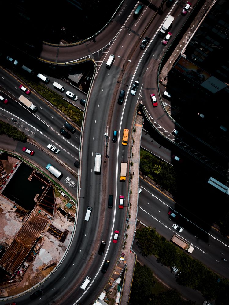 Aerial view of cars on city road