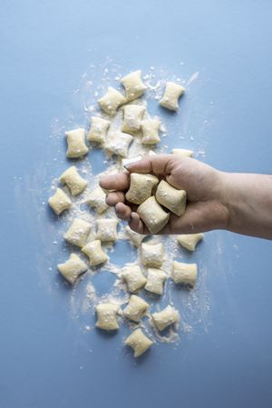 Homemade uncooked gnocchi dumplings tossed in flour