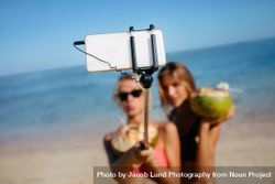 Friends taking selfie on beach bE9WGM