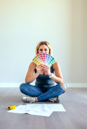 Young woman with color chart