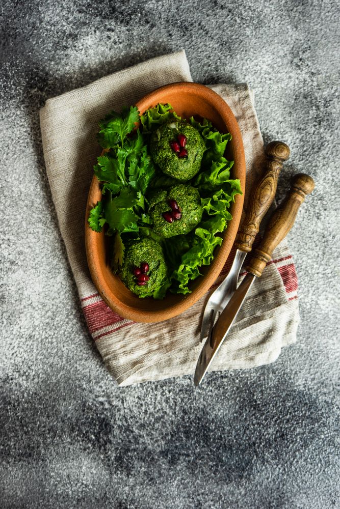 Top view of traditional Georgian dish pkhali on grey counter