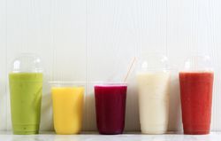 Different Color Juice on Plastic Cup Packaging