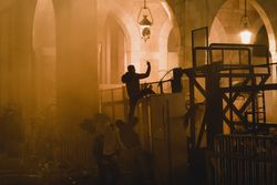 People uprising against the Lebanese parliament surrounded by teargas