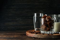Composition of prepare ice coffee on wooden background