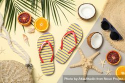 Summer vacation accessories on two tone background, top view 0v3aNp