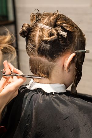 Process of cutting bob, back view