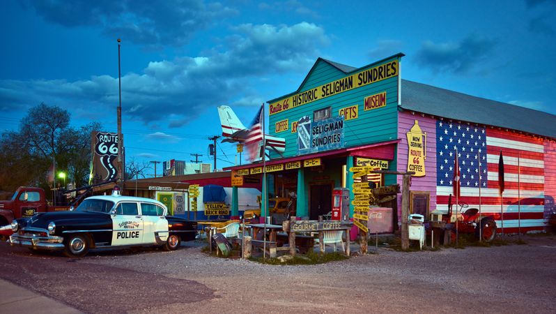 Colorful painted Western storefront at dusk on Route 66