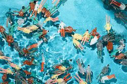 Toy people floating in water
