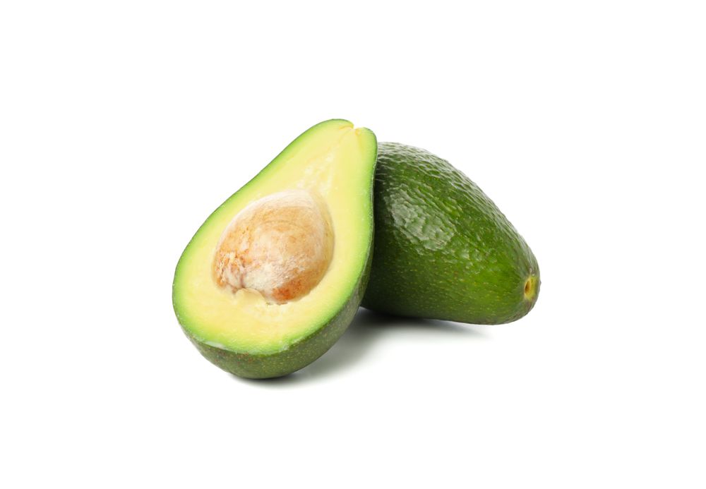 Ripe fresh avocado isolated on plain background