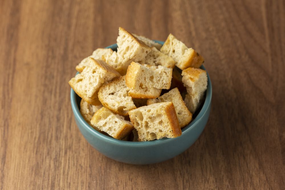 Delicious crunchy croutons on the table.