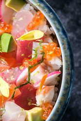 Poke bowl with vegetables and caviar
