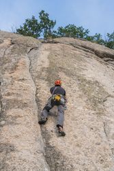 Man climbing a rock