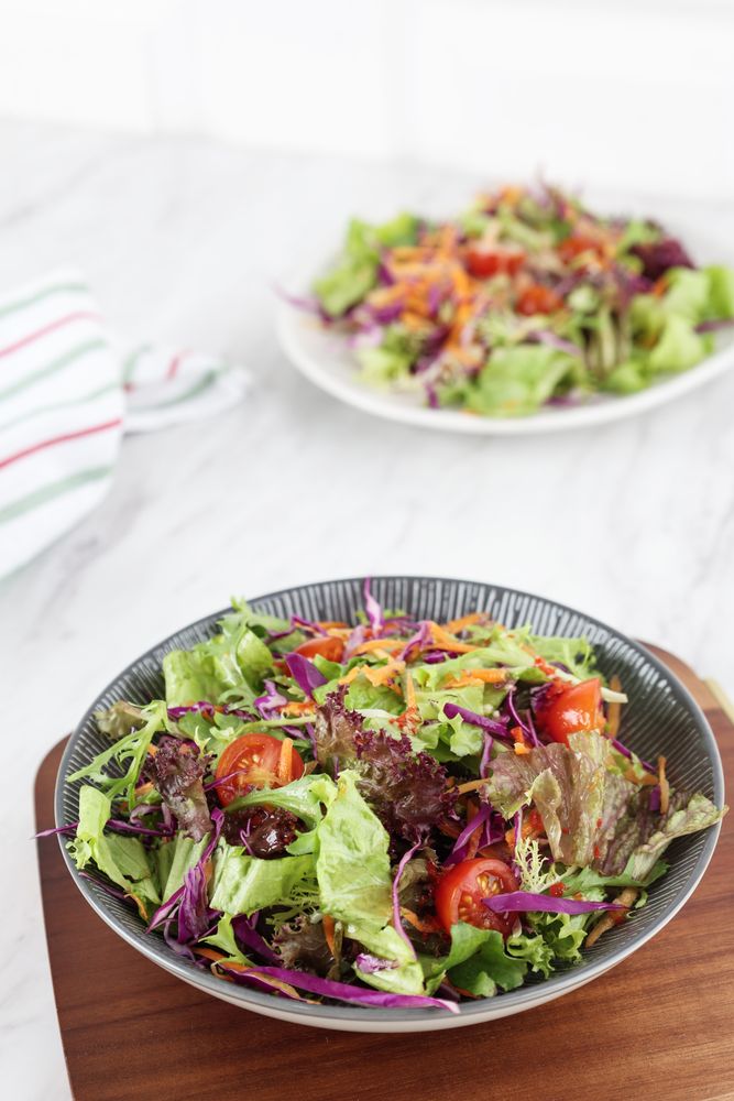 Healthy Vegetable Salad with  Green Purple Lettuce, Cherrry Tomato, Red Cabbage, and Endive.
