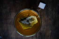 Top view of glass of green tea in cup