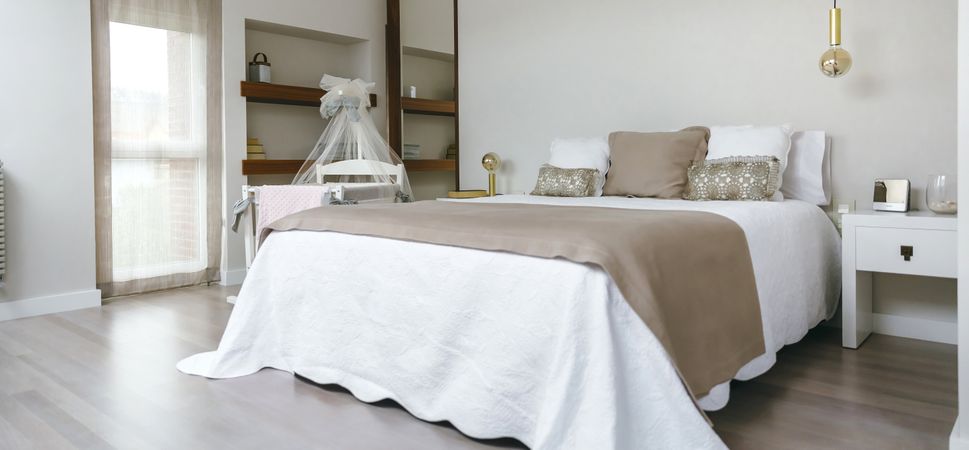 Bedroom with double bed and cot