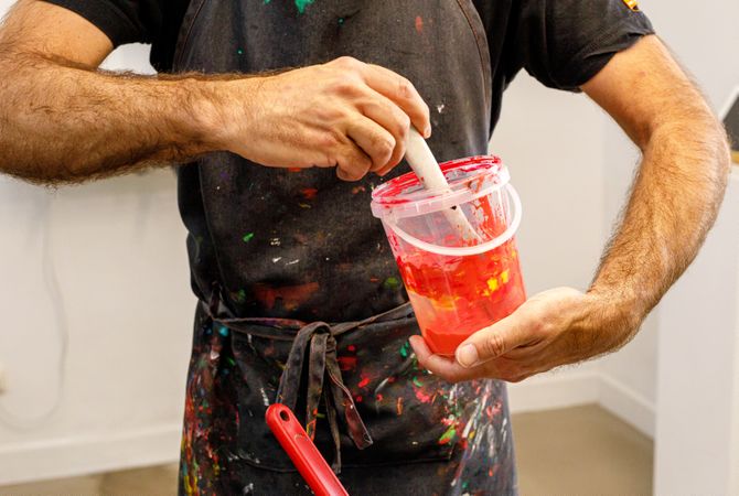 male artist preparing paints