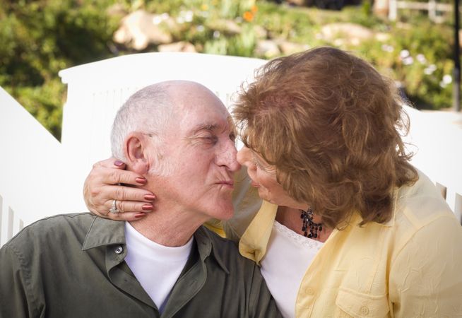 Mature Couple Kissing in the Park