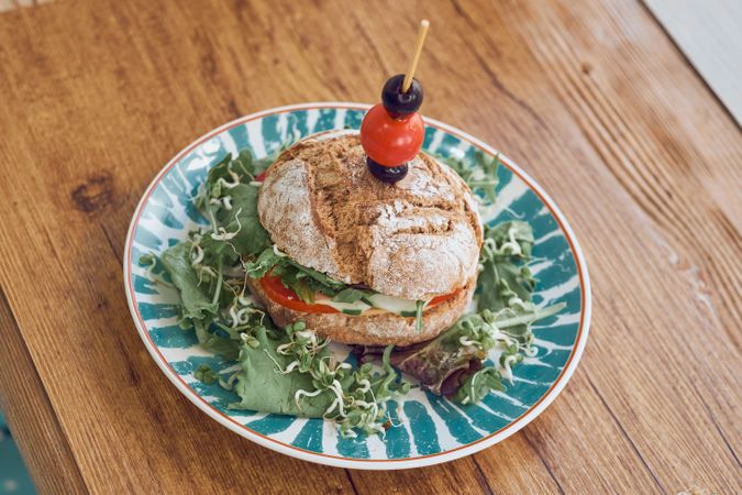 Healthy hamburger on ceramic plate